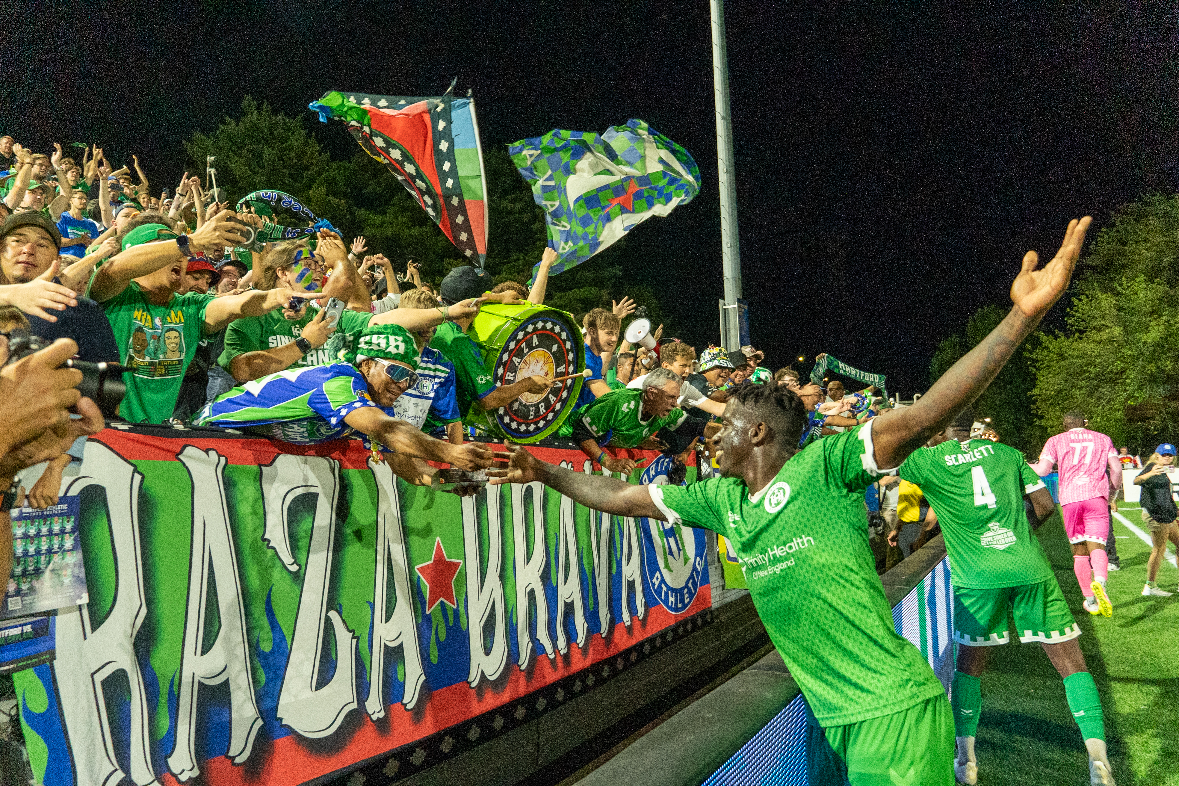 Player Greeting Fans in Stand
